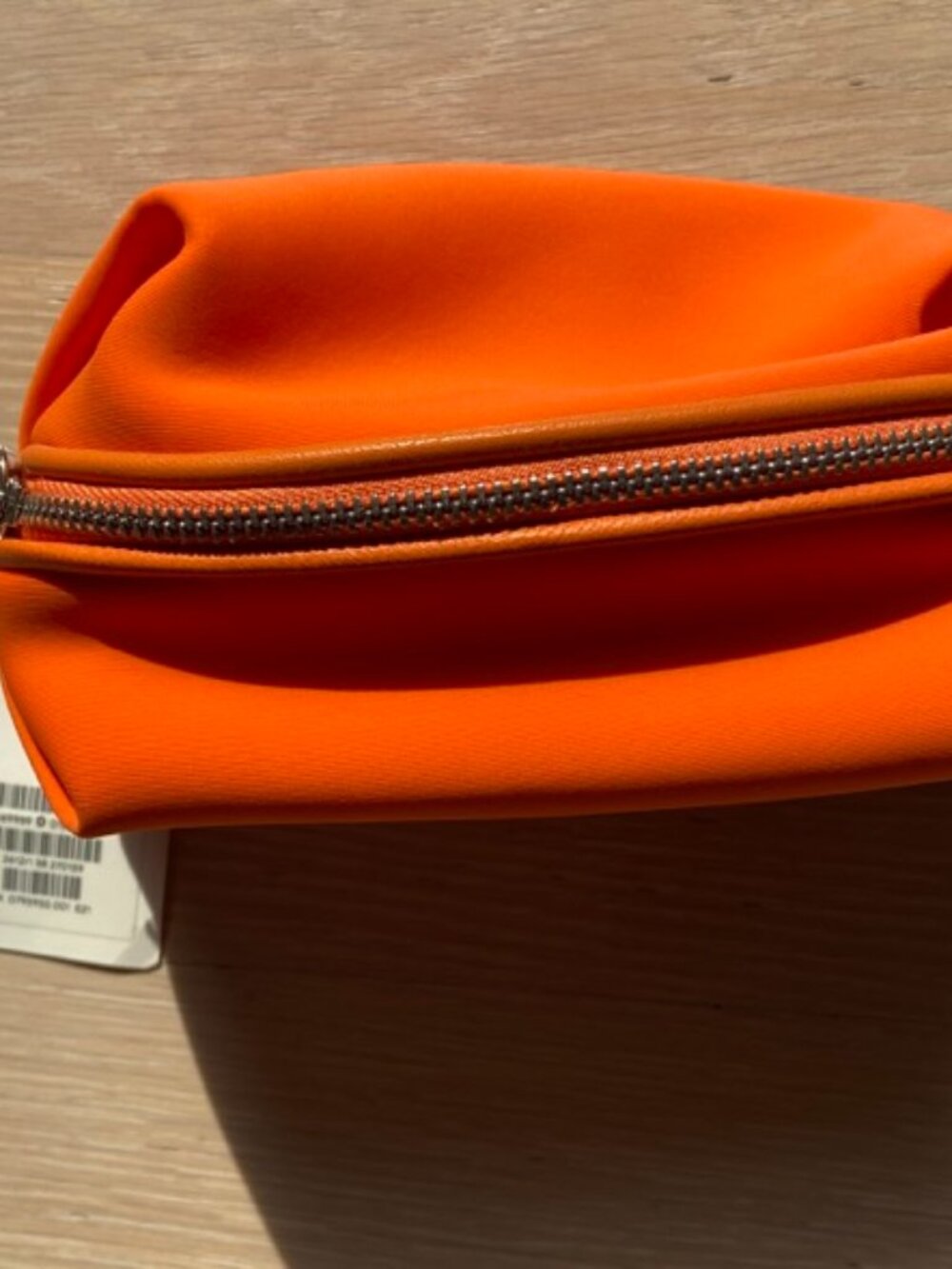 COS orange neoprene zip pouch, new with tag, silver zipper and clip, lined